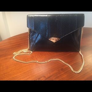 MIchael Kors snakeskin clutch w/crossbody chain